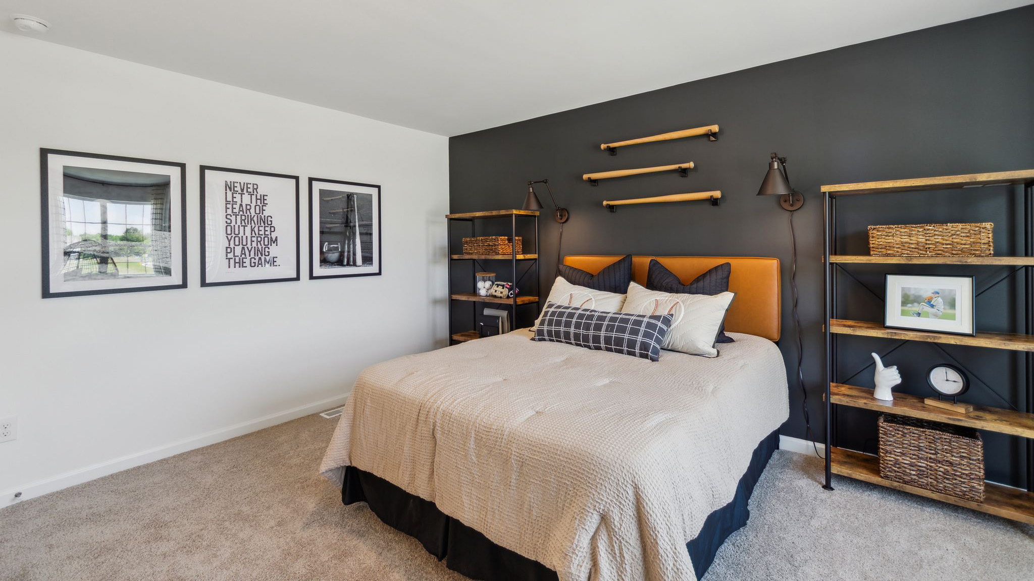 Different view of the bedroom with the black accent wall.