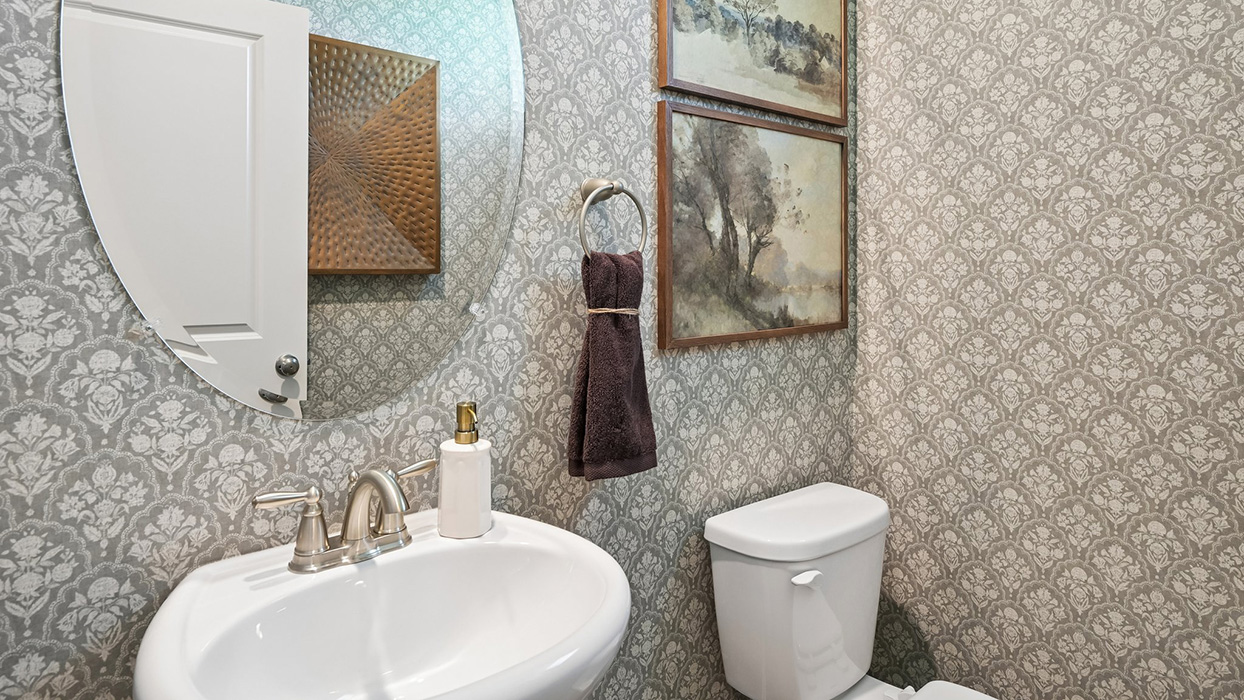 First floor has a powder room with sink and toilet.