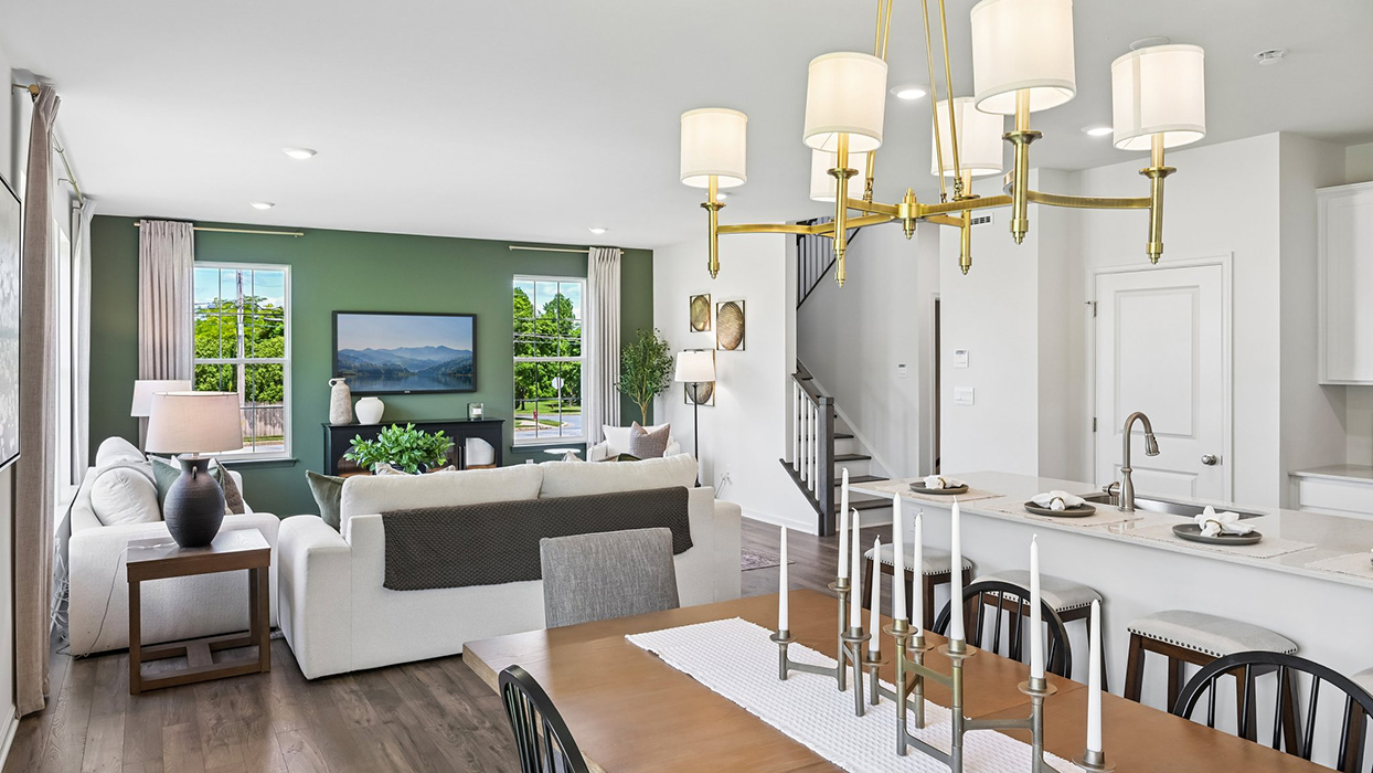 Open-concept allows a view encompassing dining, kitchen, and living areas.