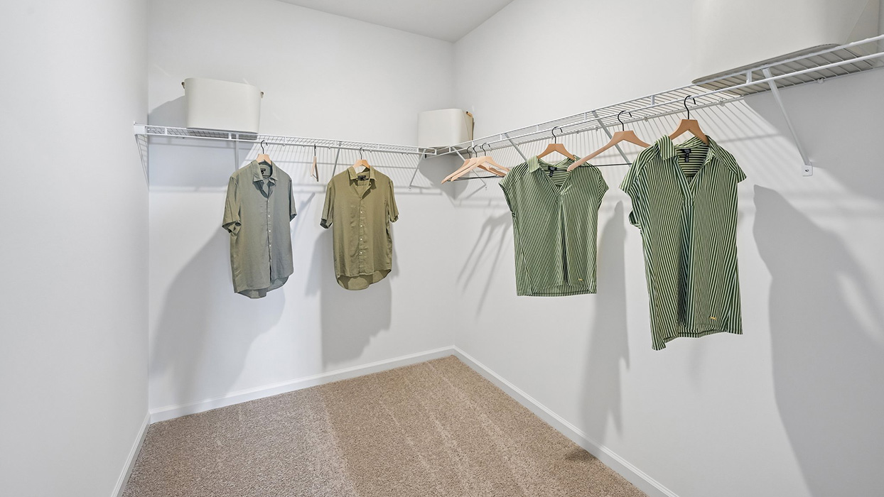 Large walk-in closet fit for fashionistas.