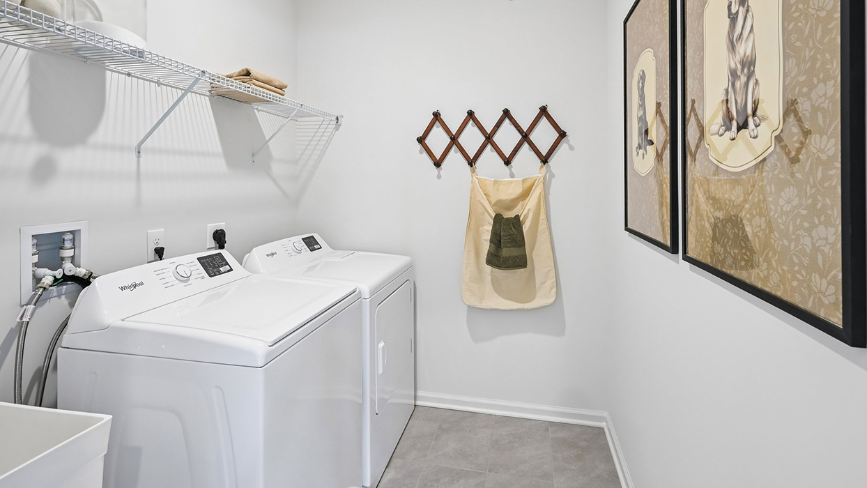 Upstairs has a convienently located laundry room.