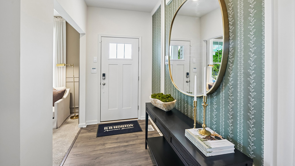 Front door opens up to main hallway and flex space.