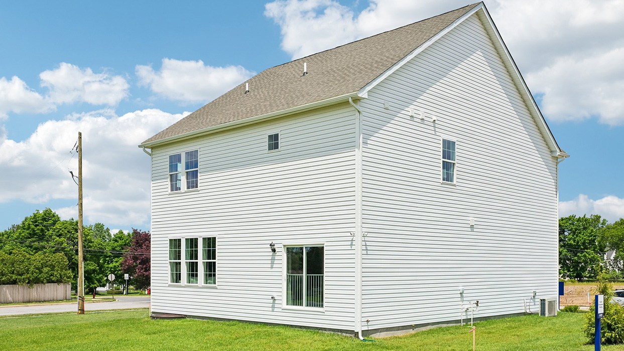 Rear side-view of the Sorrento showing five windows and a sliding backdoor.