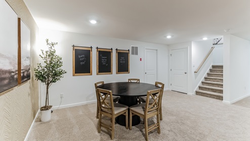 Large finished basement area perfect for entertaining.