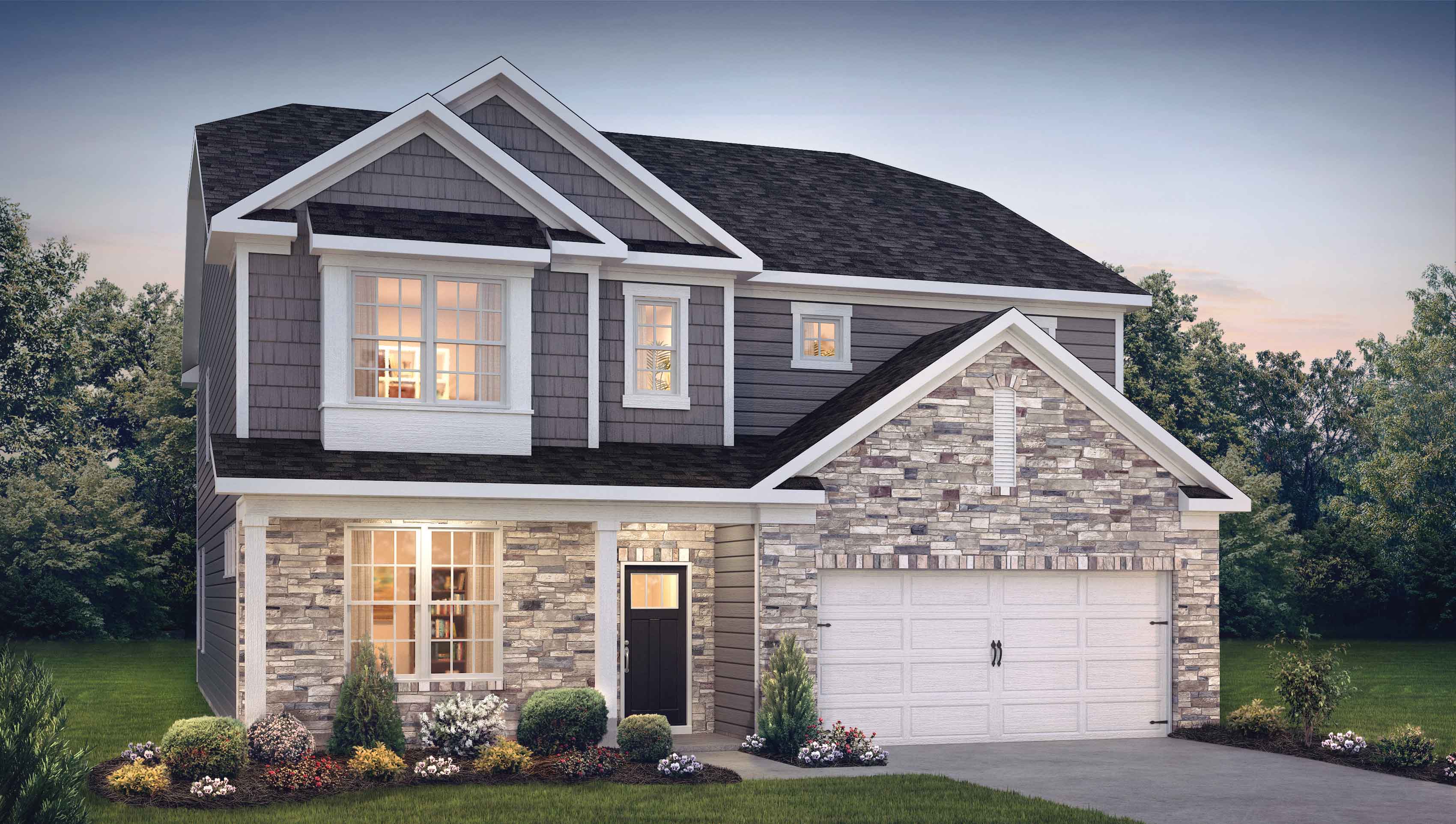 Exterior front image of a two story gray and stone home with double garage.
