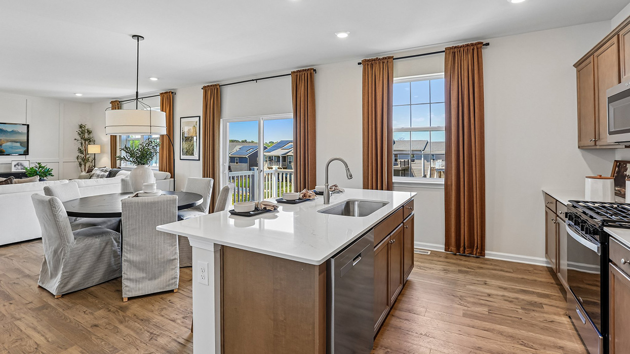 The kitchen flows seamlessly into the dining space and the sizeable great room.