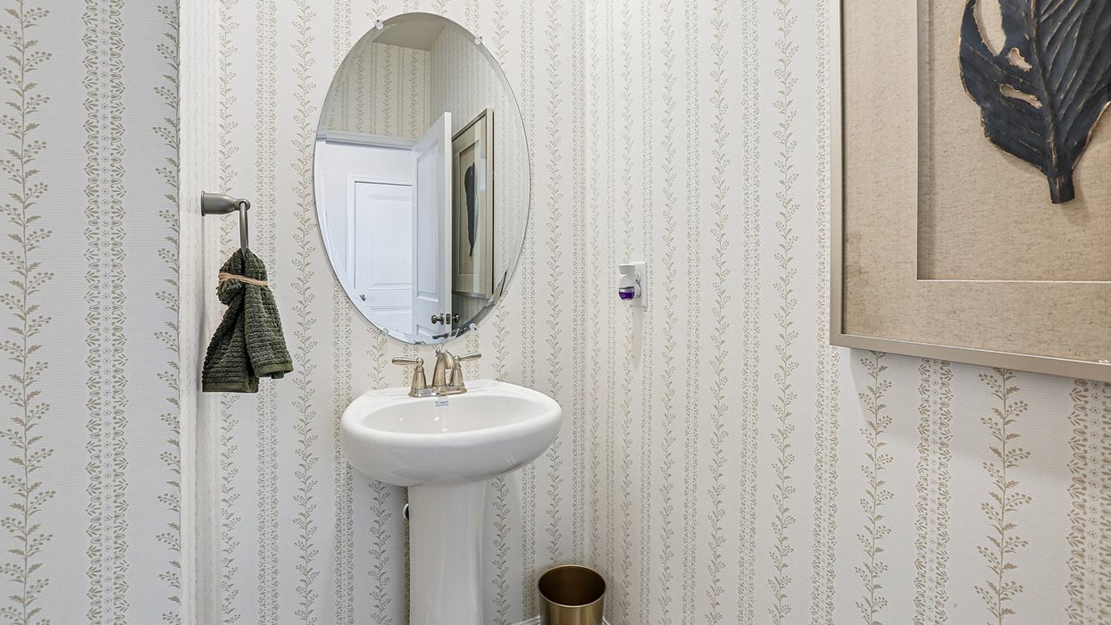 The first floor also offers a powder room.