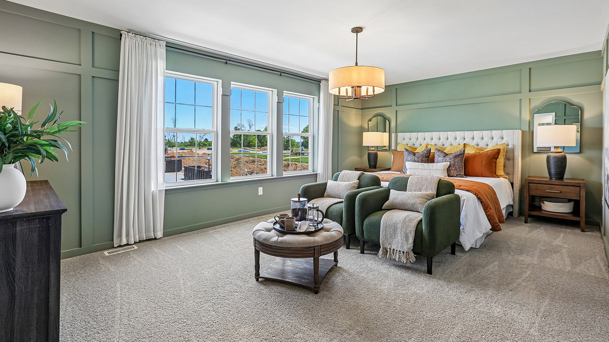 The impressive owner’s suite boasts an expansive bedroom.