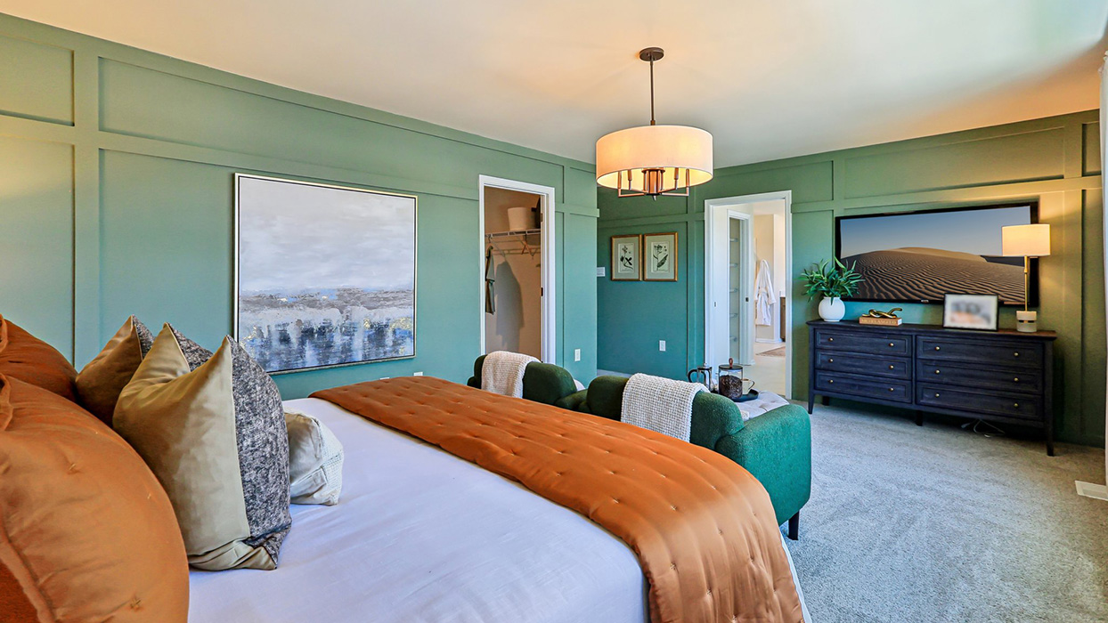 The impressive owner’s suite boasts an expansive bedroom and a contemporary owner’s bathroom.