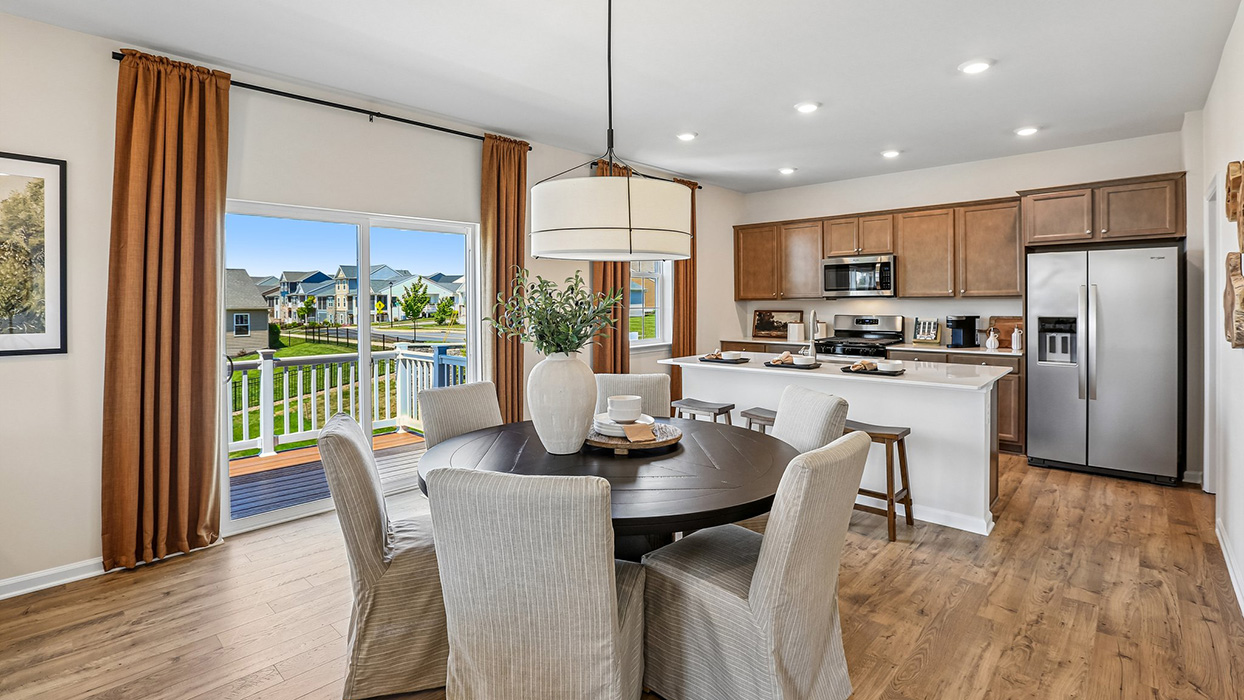 The dining space flows into the kitchen.