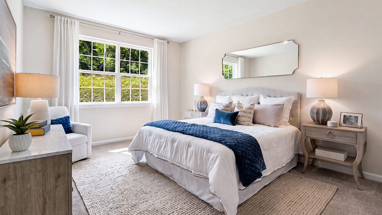 A different view of bedroom three with one closet door