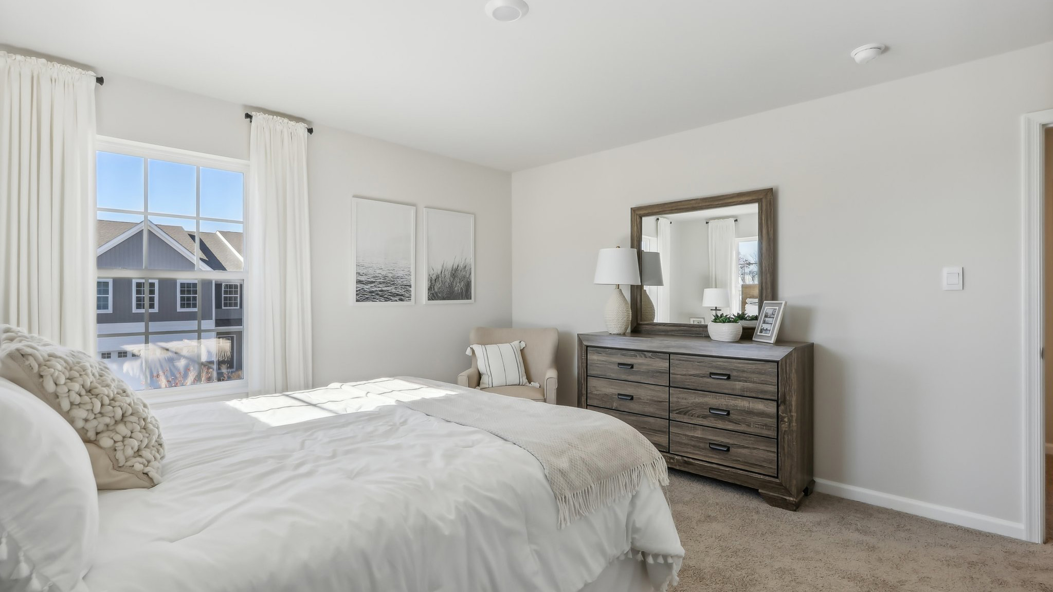 second floor bedroom with beige carpet