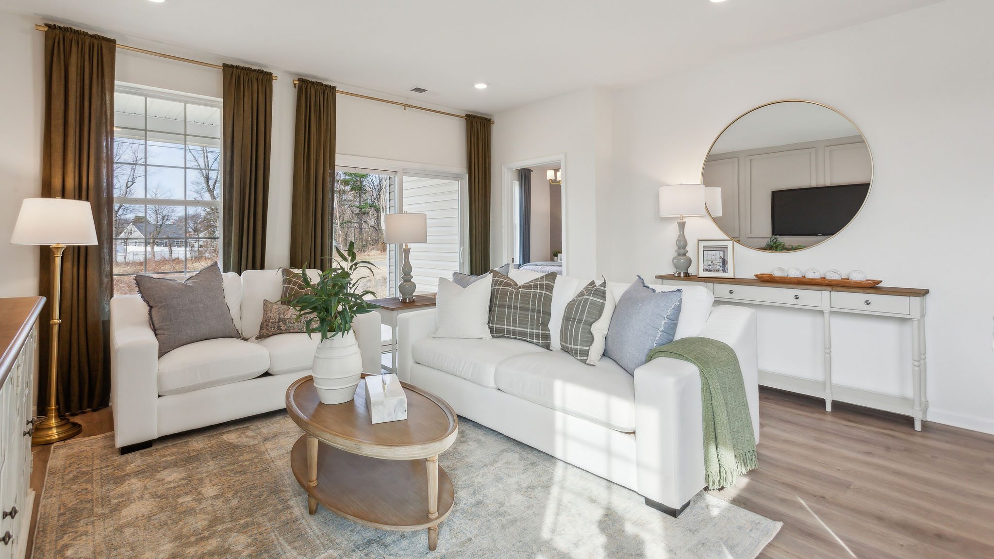 The living area with a view towards the covered patio.