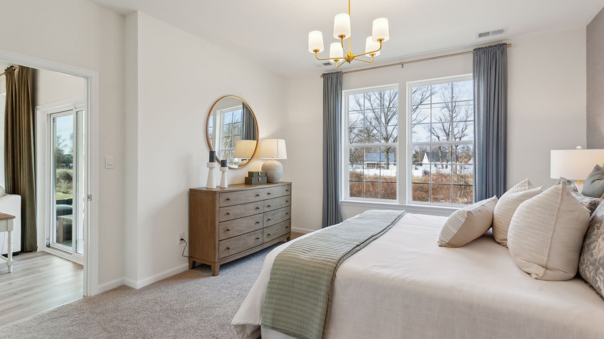 The primary bedroom has a large double window.