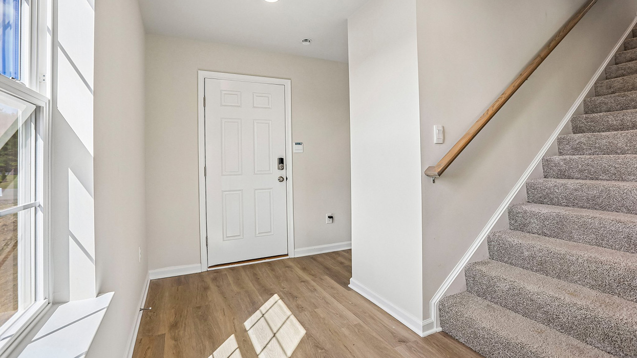 entry with stairwell to the second floor