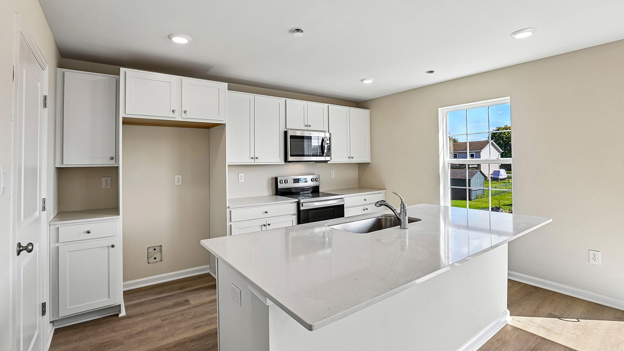 kitchen with white cabinets