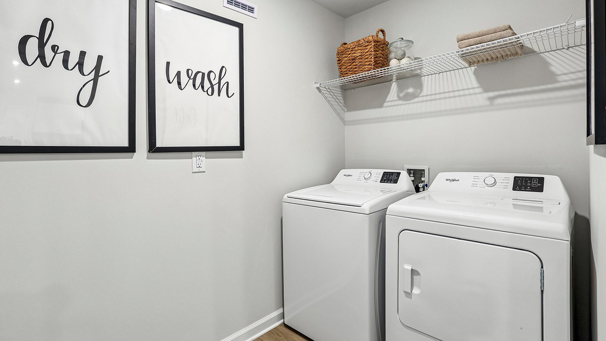 The laundry closet with washing machine and dryer