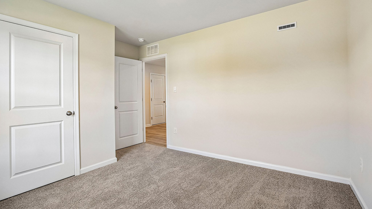 bedroom four with a closet