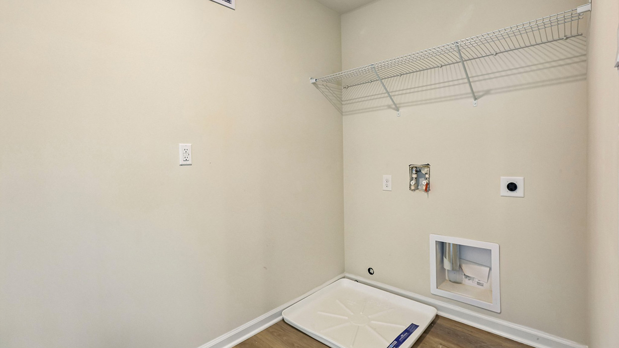 a laundary room is located off the main living space
