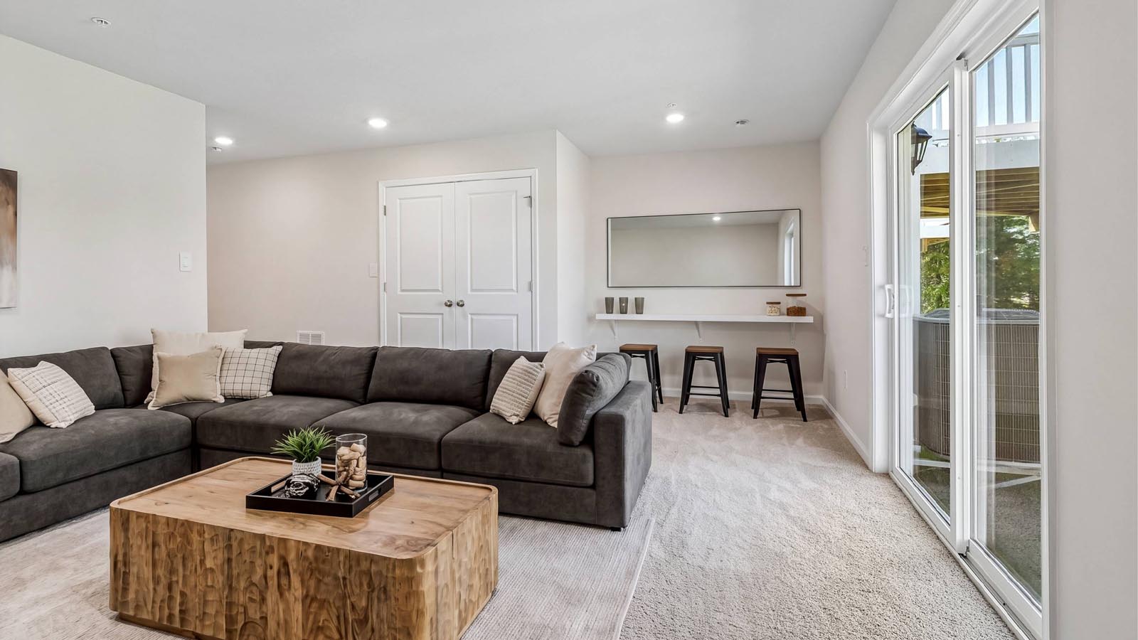 Finished recreation room is a versatile space for gathering and relaxing.