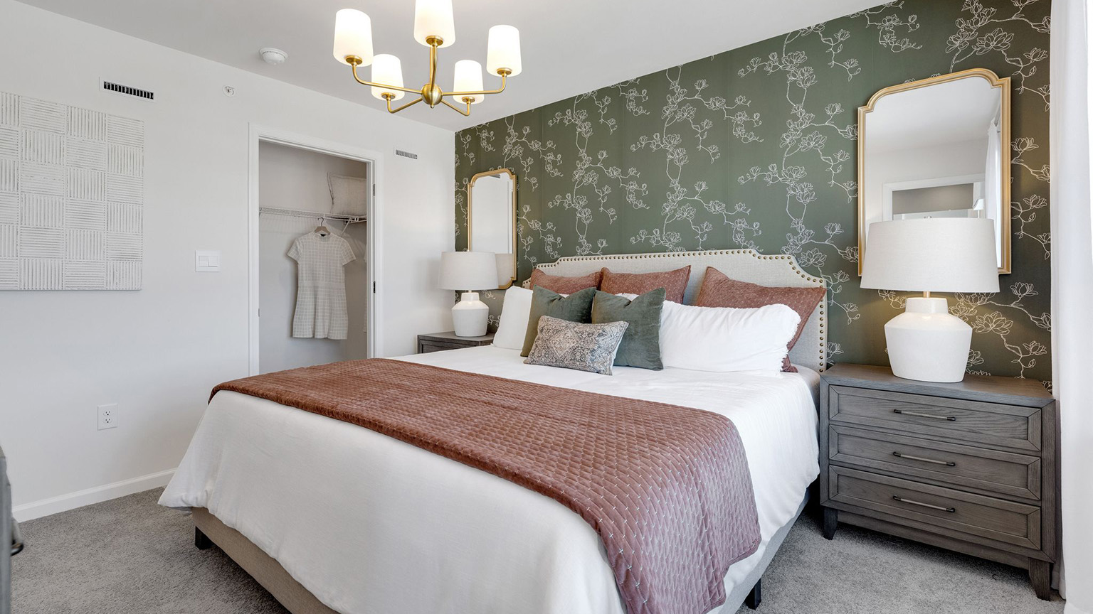 Primary bedroom with a closet.