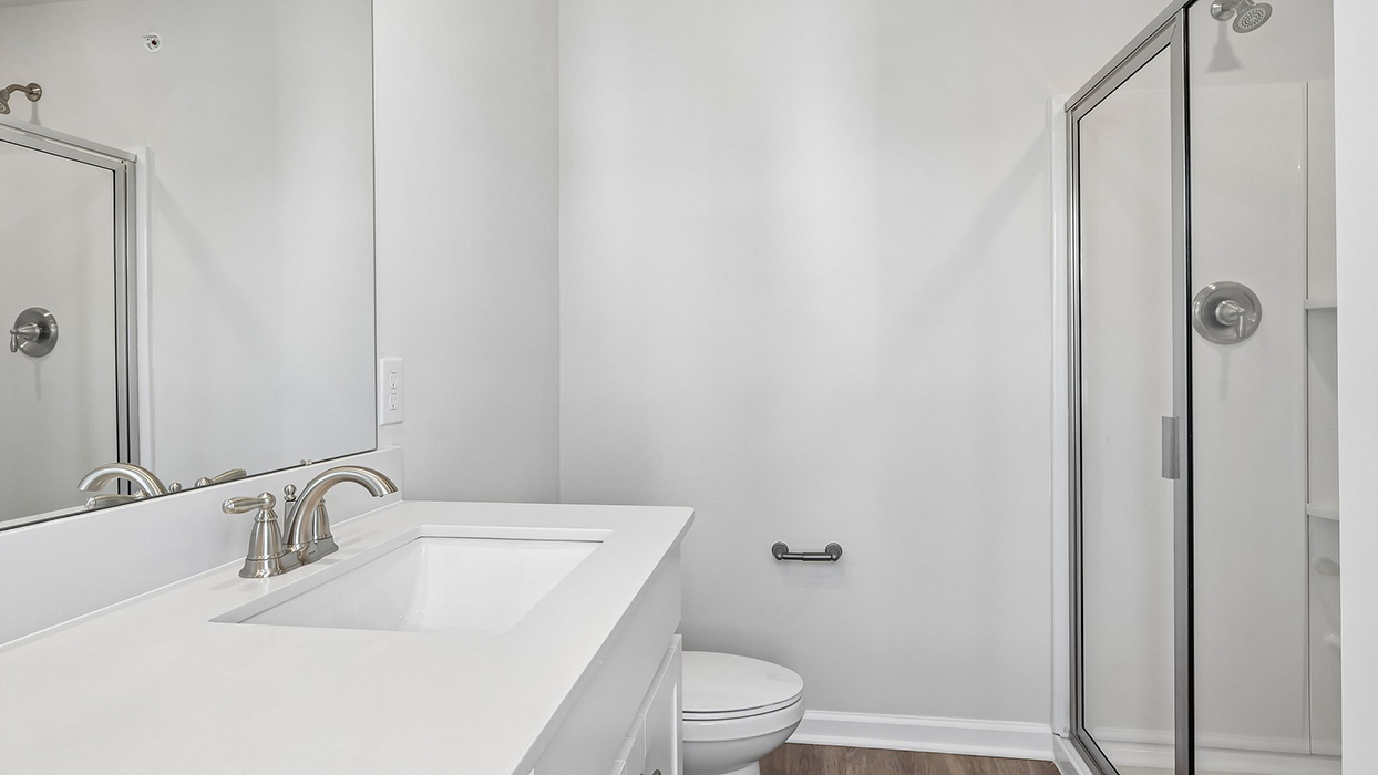 A view towards the back of the primary bathroom.