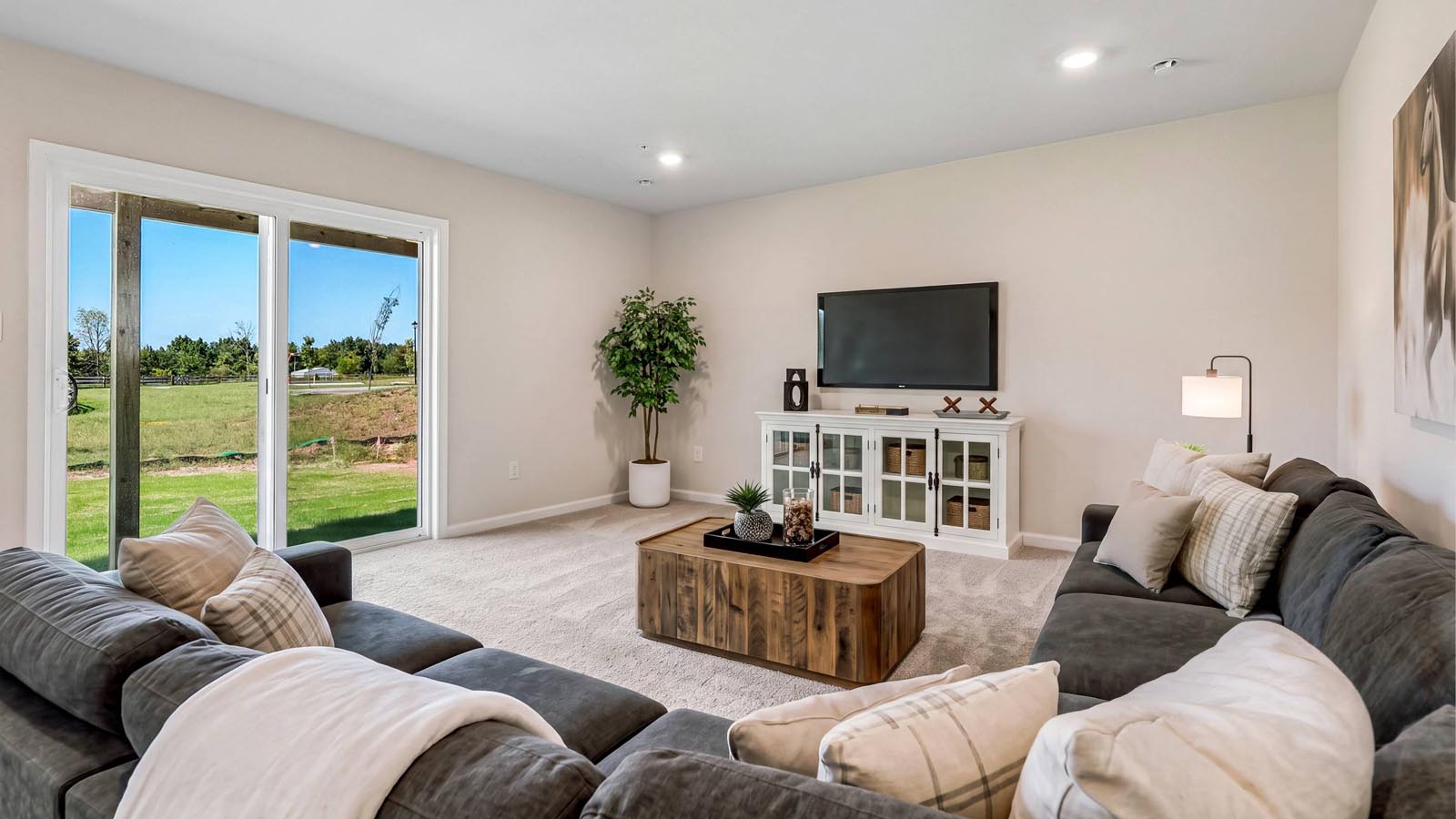 Finished recreation room is a versatile space for gathering and relaxing.
