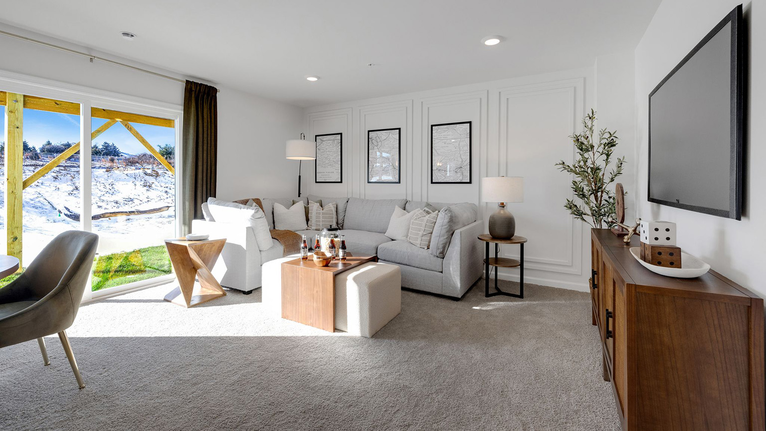 Finished recreation room is a versatile space for gathering and relaxing.