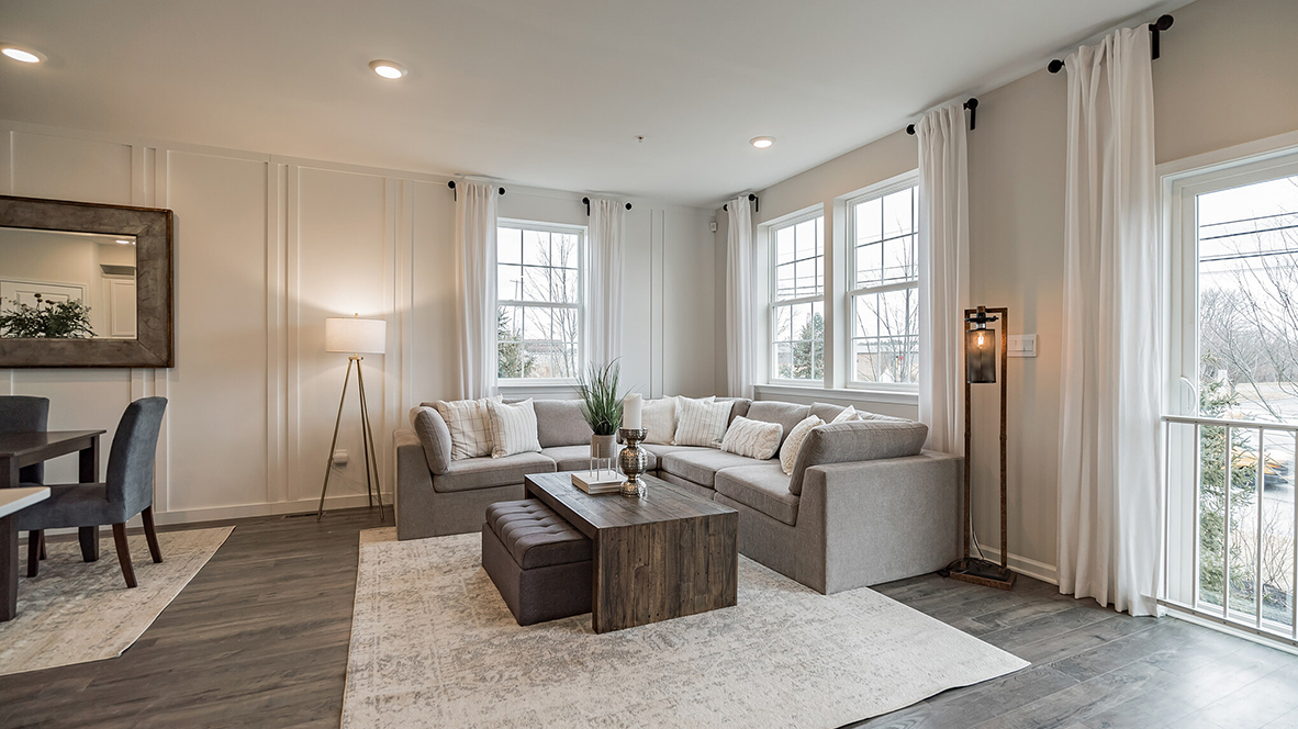 Living area with dining area to the left and the Juliet balcony door to the left.