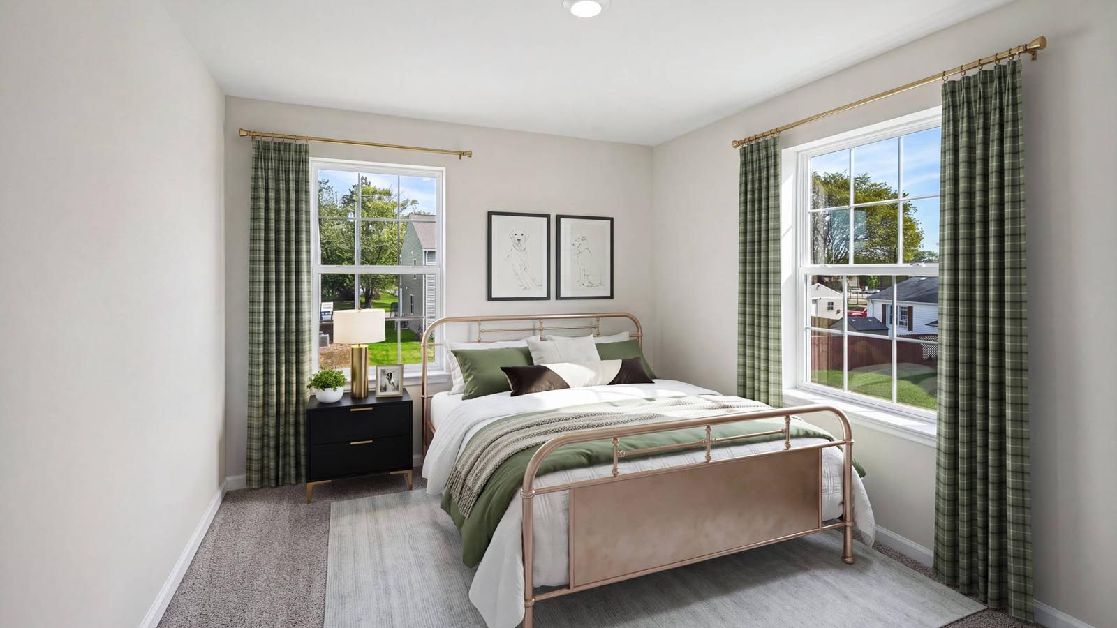 Bedroom two with two windows.