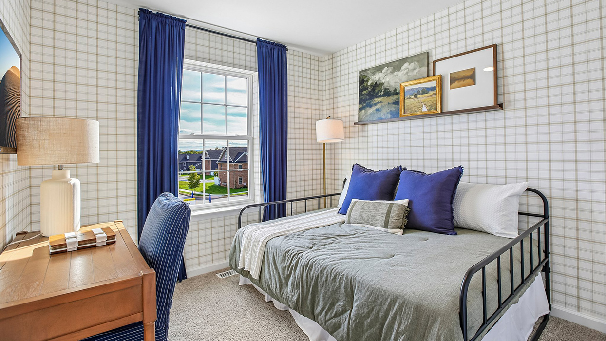Bedroom three staged as a guest room