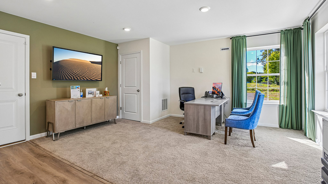 A versatile finished recreation room used an office space