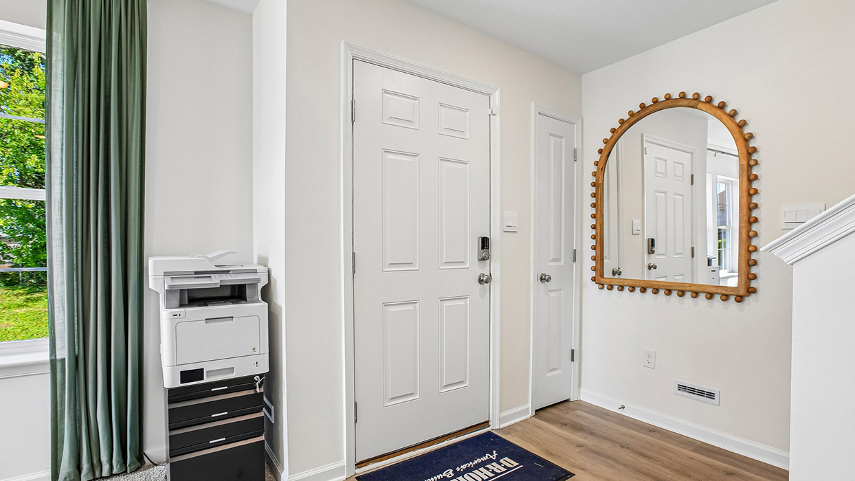 The front door leading out of the finished recreation room
