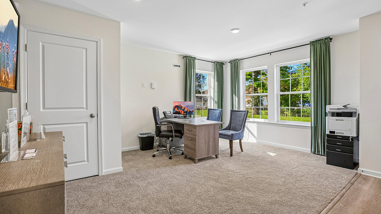 A versatile finished recreation room used an office space