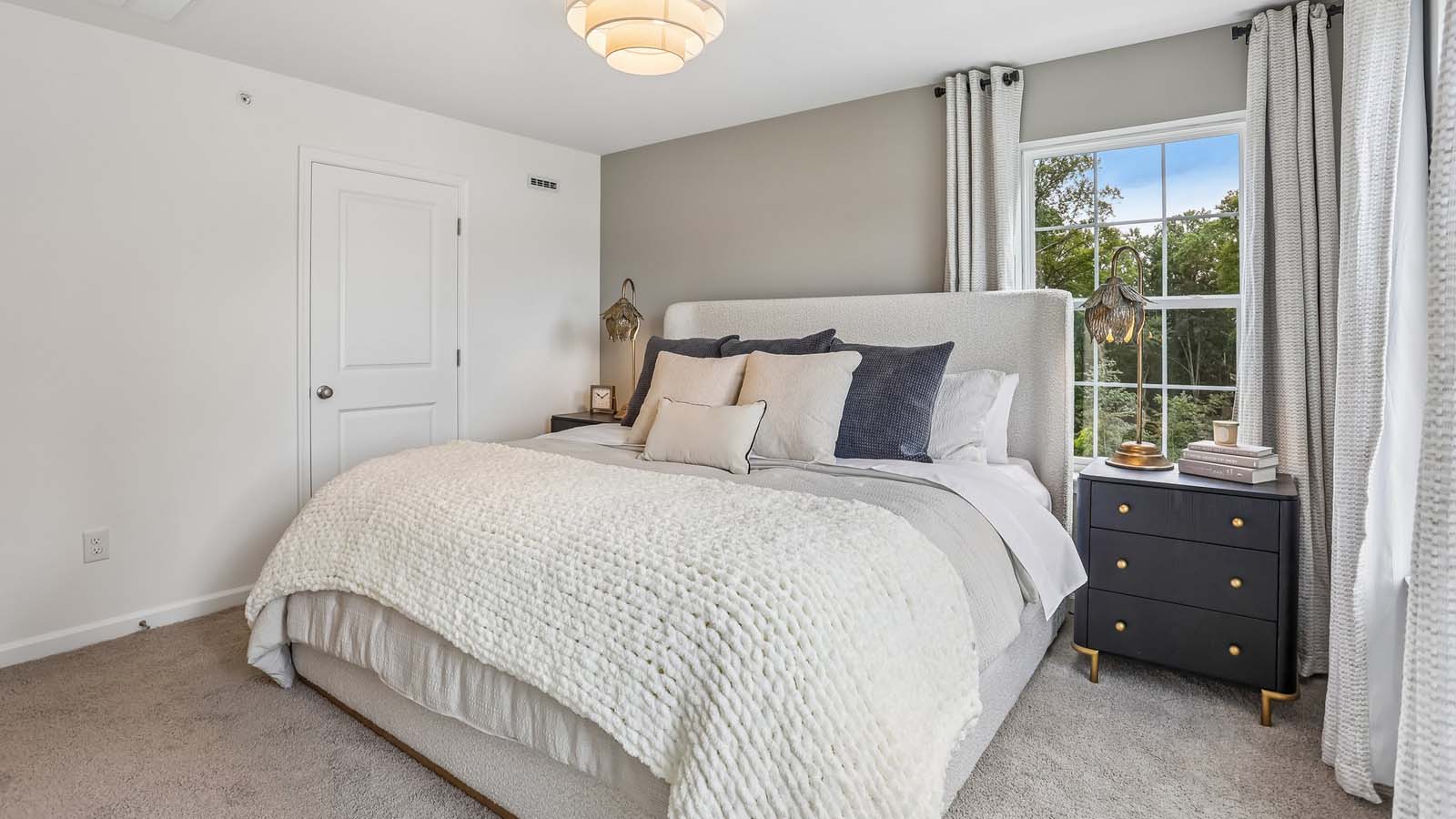 Primary bedroom with a closet