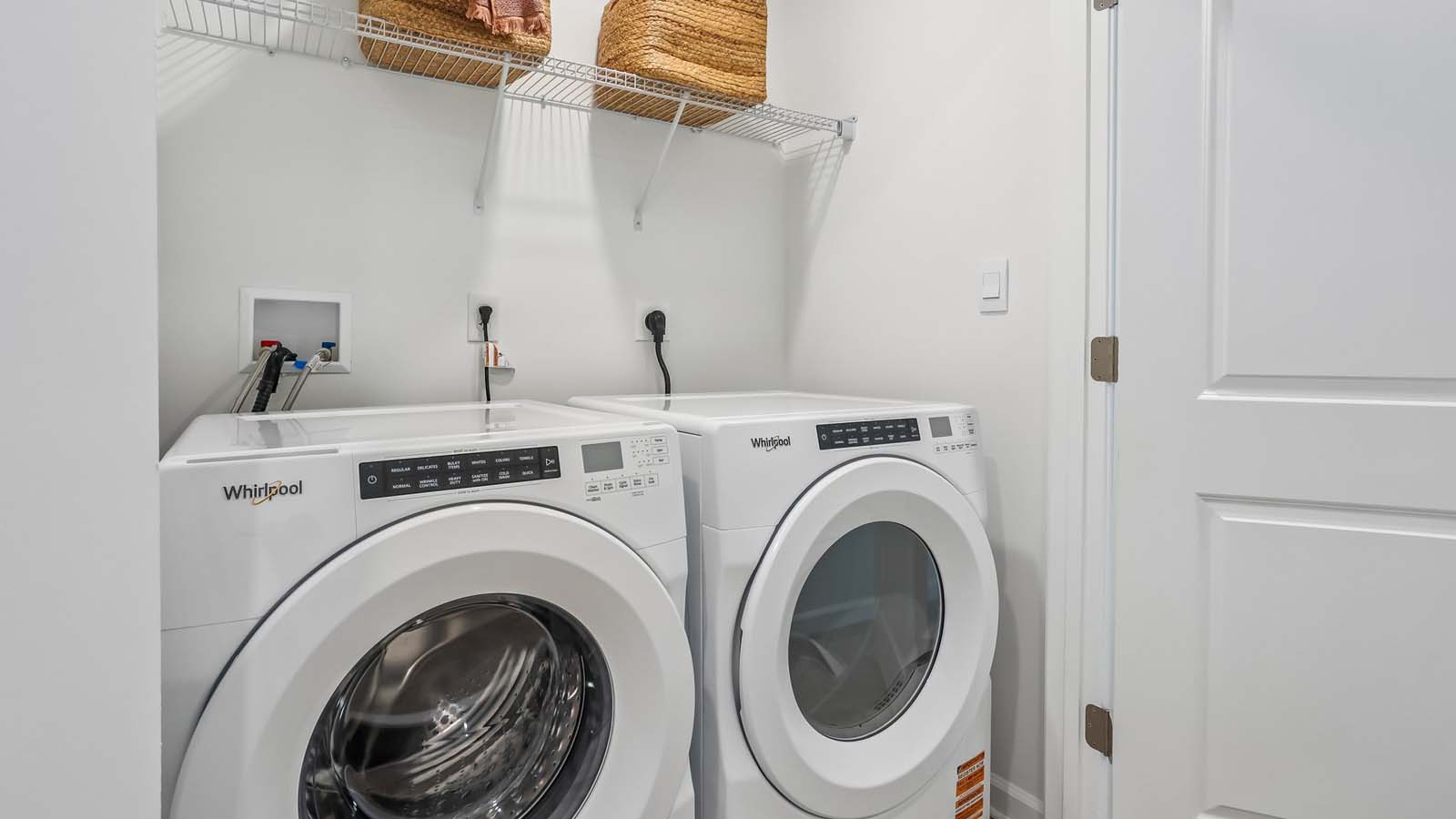 The laundry closet with washing machine and dryer