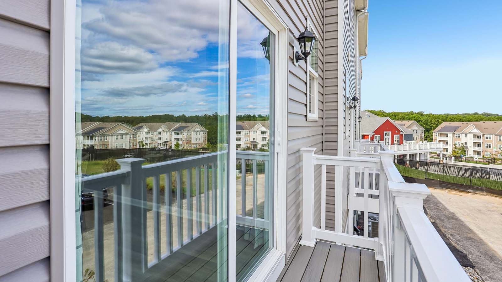 Rear deck with sliding glass door