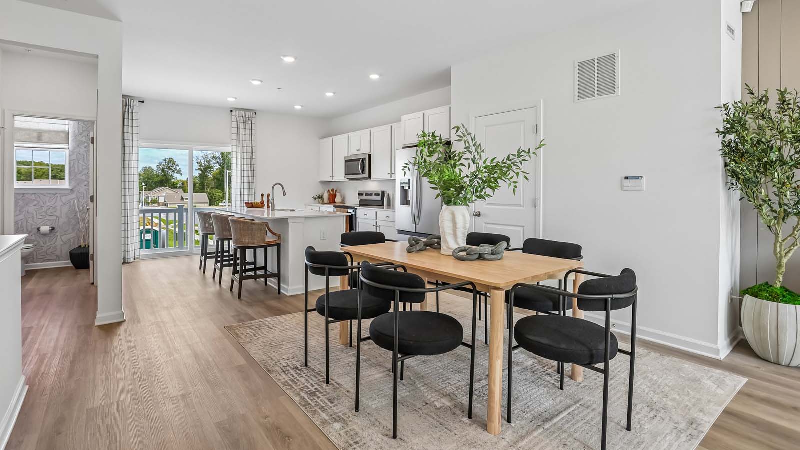 A view of the open concept dining and kitchen area