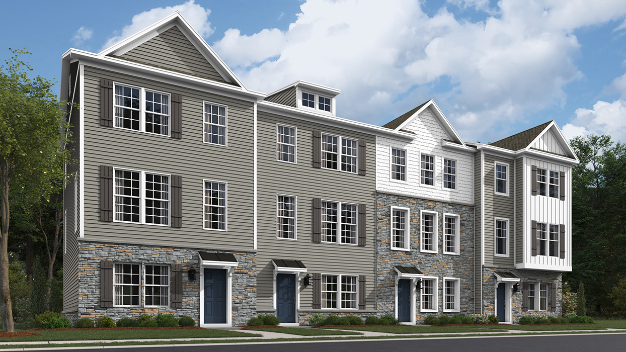 A rendering of the Norris plan 4-unit townhome building with harvard slate color siding, white  accent siding, tuxedo gray shutters, and a naval blue front door.