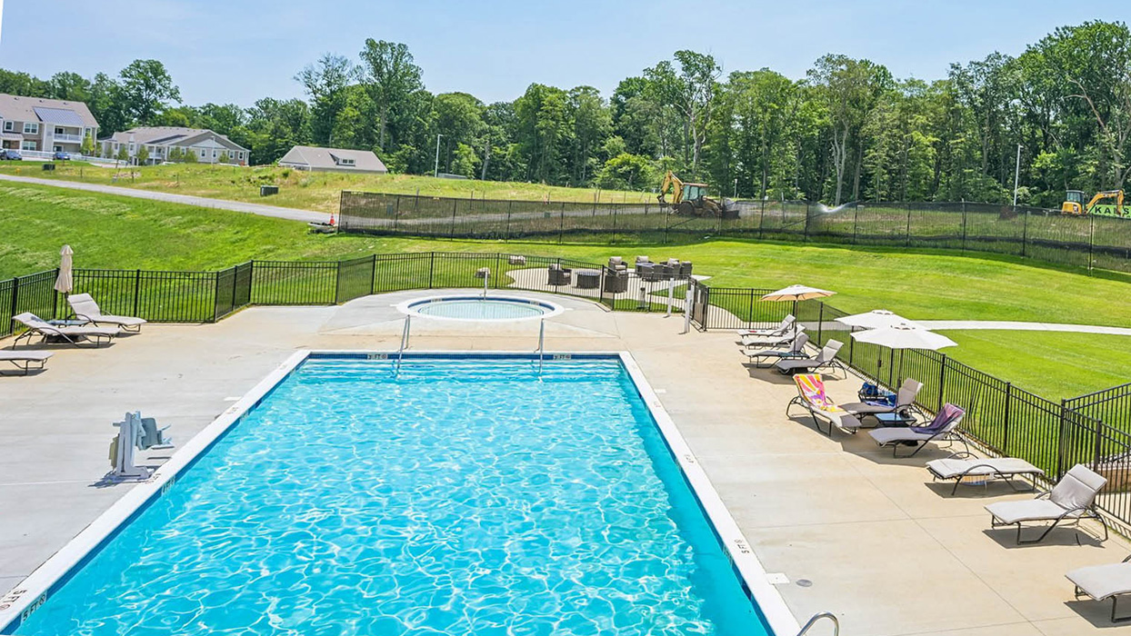 Photo of Mi-Place's large pool and expansive lounge area