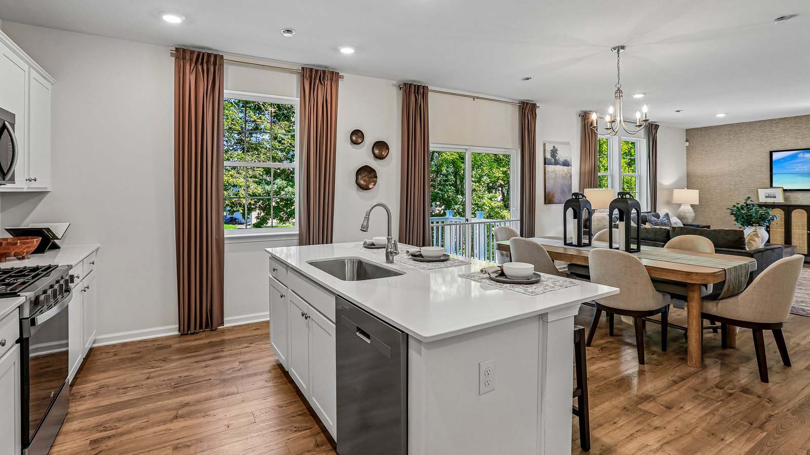 The kitchen flows seamlessly into the dining space and the sizeable great room.