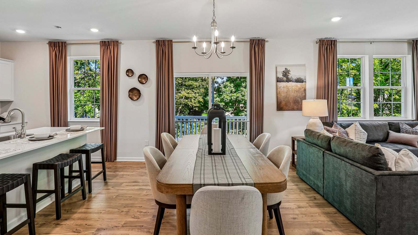 Open-concept dining, living, and kitchen areas.