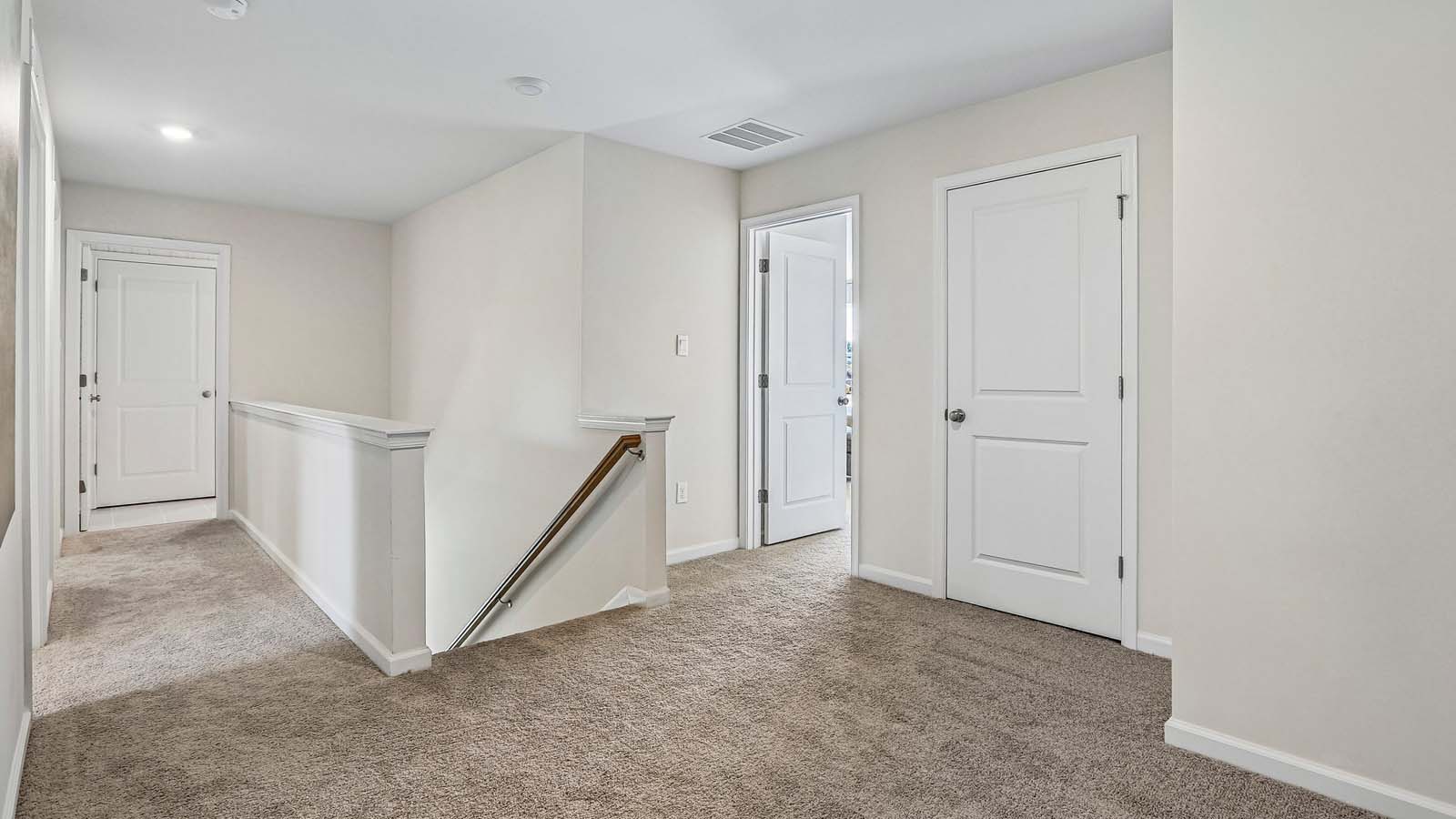 A view of the upstairs landing to the second floor.