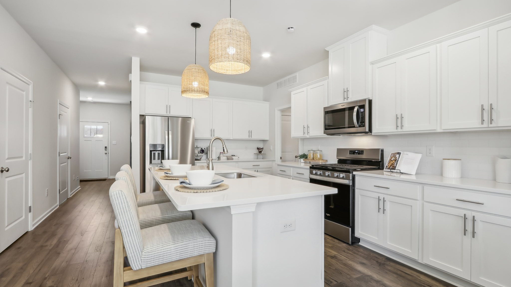 white island with breakfast bar seating