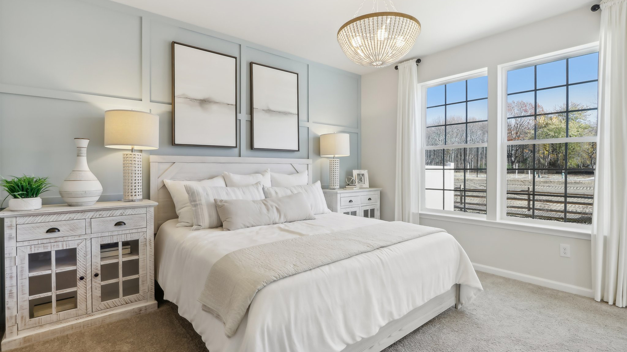 White bedroom with beige carpet