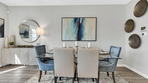 Modern dining area with a six seater table.