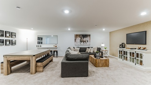 Different view of the large finished basement area.