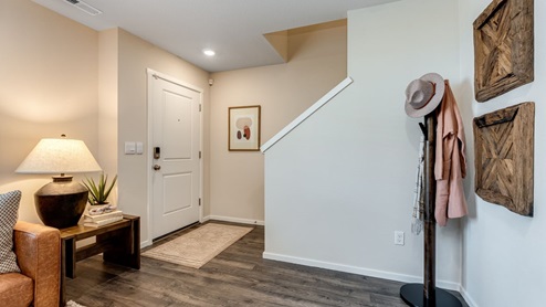 Entryway with staircase upstairs