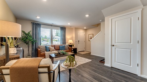 open-concept living room. Premium laminate flooring