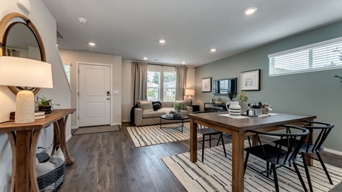 open-concept living room. Premium laminate flooring